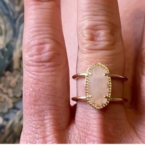 Gold and Pink Ring with Oval Gemstone and Halo of Sparkling Stones